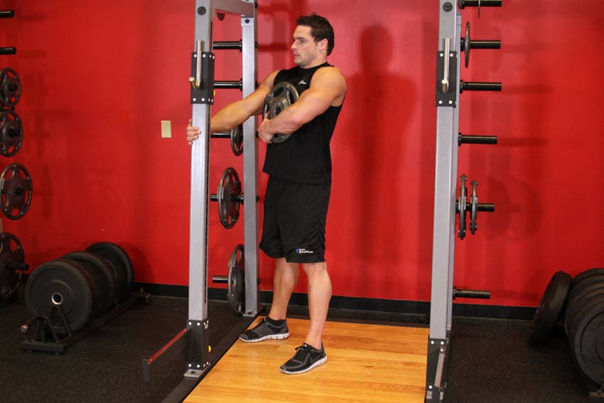 Weighted Sissy Squat, position 1 of 2