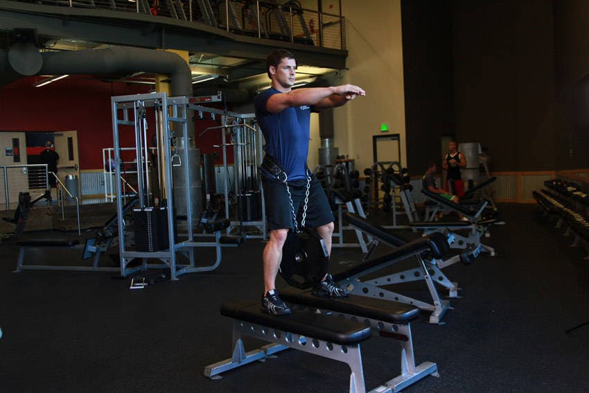 Weighted Squat, position 1 of 2