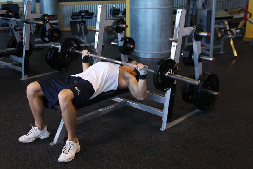 Wide-Grip Barbell Bench Press, position 2 of 2