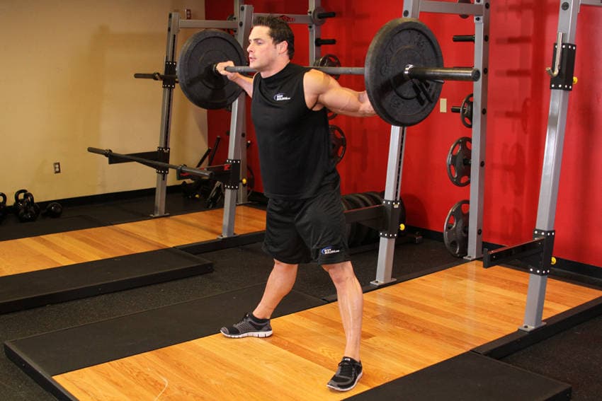 Wide Stance Barbell Squat, position 1 of 2